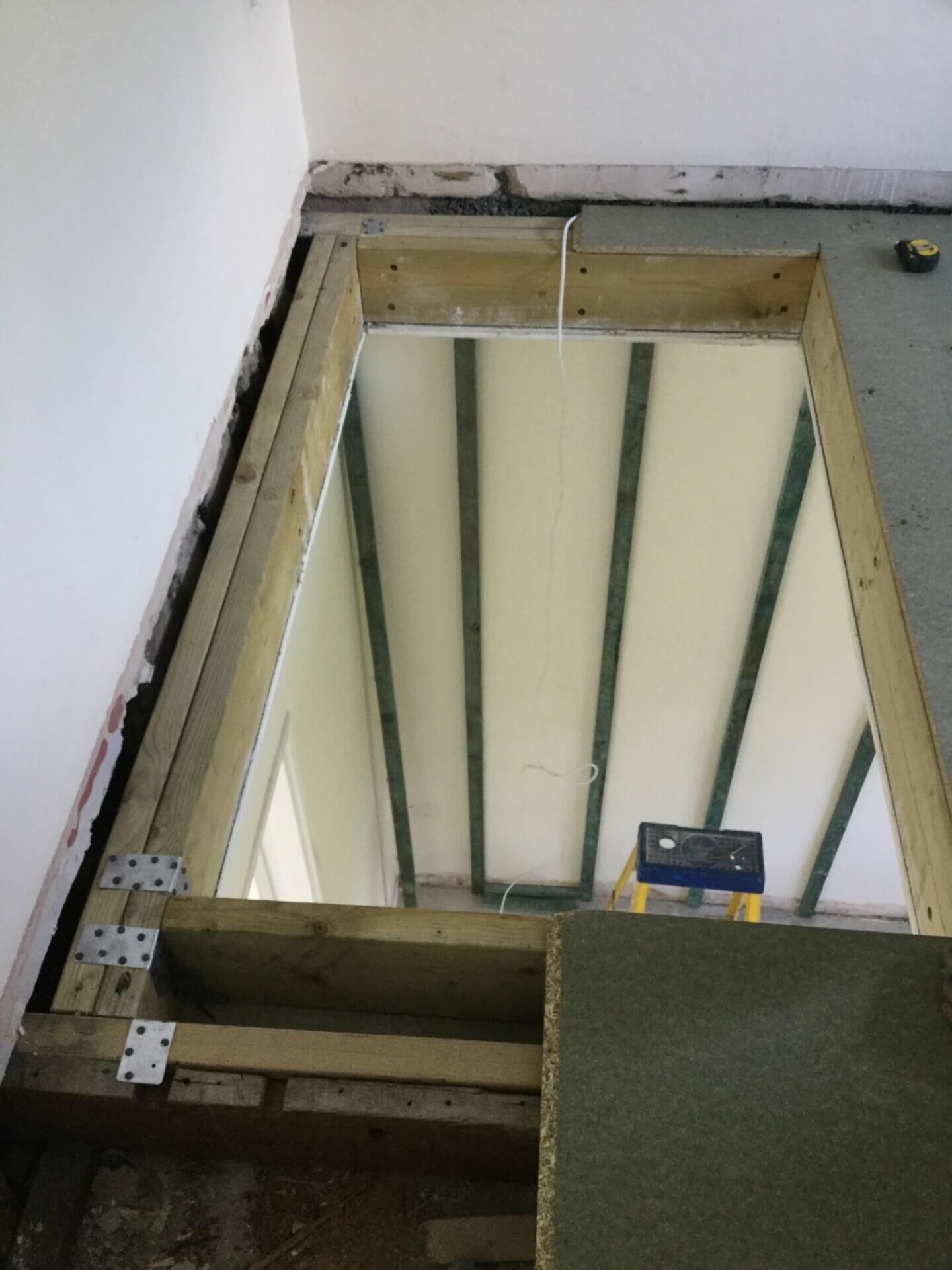 Structural floor opening and preparation works for a Wessex VM through-floor home lift prior to installation.